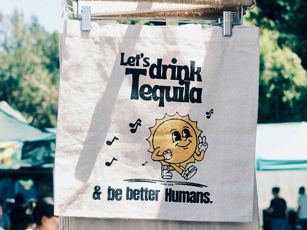 Custom Calico Tote Bag Screen Printed with Let's Drink Tequila Sun Logo