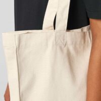 Stanley Stella Shopping Tote Bag Model Close Up View in Natural