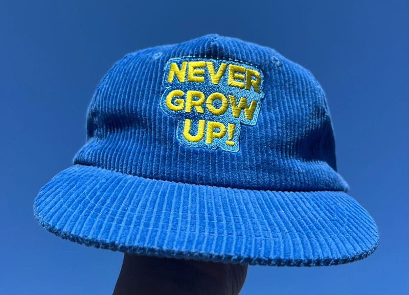 Custom Cord Hat with Never Grow Up Embroidery in Yellow Thread