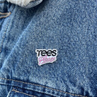 Custom Enamel Pin with Tees Please Logo on Denim Jacket