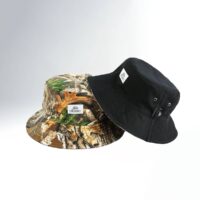 Reversible Bucket Hat with Camo Print on one side and all black on the other side, customised with woven label with logo