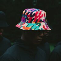 Reversible Bucket Hat Model View with colourful line design