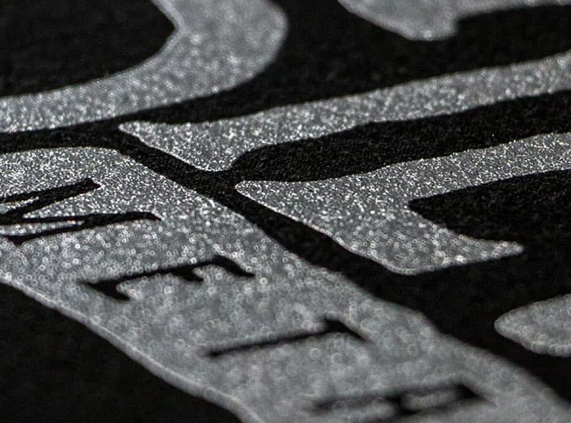 metallic screen printing metallic screen printing on a black AS Colour Heavy Tee