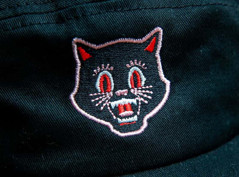 standard embroidery Custom Embroidered Cat Logo on a Black AS Colour 5 Panel Cap