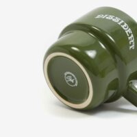 A vibrant green ceramic mug with space for a custom logo, design, or personalised text, perfect for adding a touch of uniqueness to your daily coffee or tea routine.