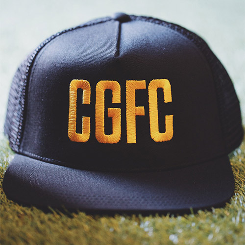 custom trucker caps embroidered with yellow thread "CGFC"