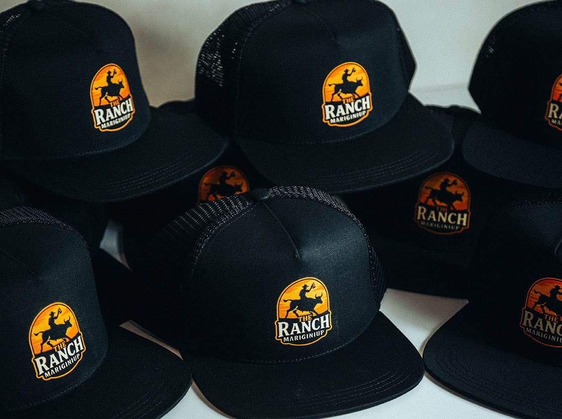 Direct to film DTF printing on black custom AS Colour Trucker Caps