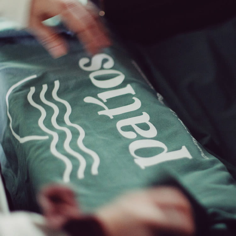 Custom Screen Printing with Patios Logo on the AS Colour Staple Tee in Sage